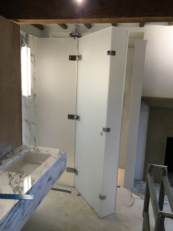 Bespoke frosted glass shower enclosure in Regent's Park luxury bathroom